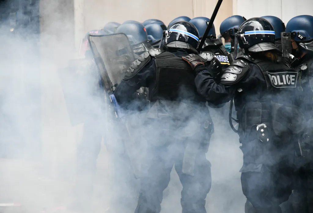 France Protests pink rally demonstrator protester protest burn fire smoke flame 