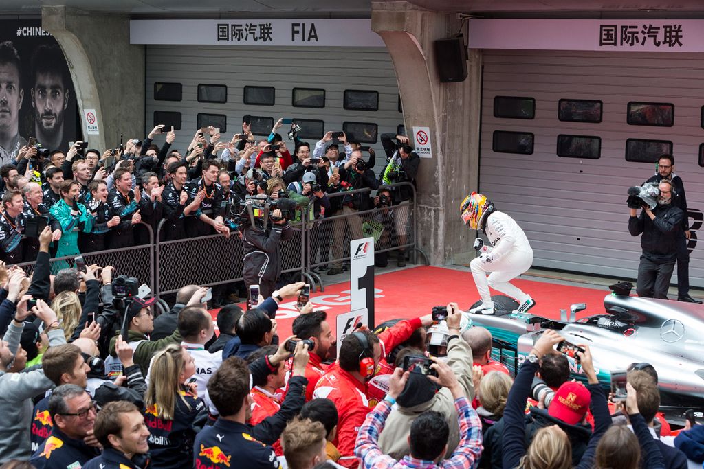 Lewis Hamilton coasts to fifth title at Chinese Grand Prix China Chinese F1 Formula 1 Formula One Shanghai Grand Prix Grand Prix British F1 driver Lewis Hamilton of Mercedes celebrates on his car after winning the 2017 Formula One Chinese Grand Prix at th