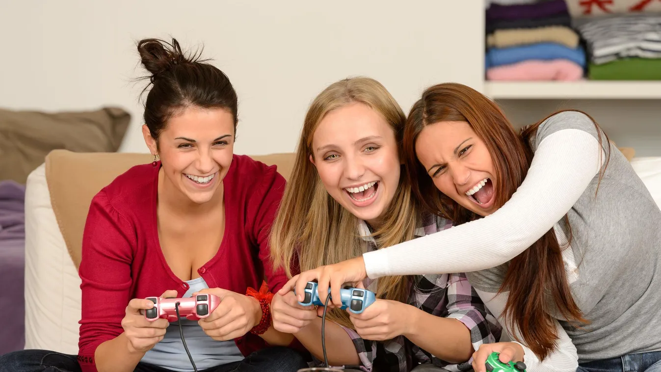 activity adolescence bowl carefree caucasian chips computer console drinks enjoying entertainment friends friendship fun game gaming girls happy indoor joystick laughing leisure lifestyle people playing potato relaxing sitting smiling snacks teenagers tog