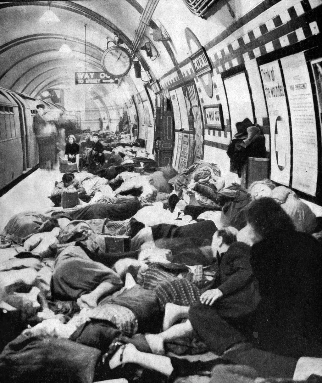 Londoners sheltering Photograph WWII 20th century 1940s Forties Station Sleeping Sheltering Civilians Danger Square Vertical SECOND WORLD WAR SHELTER METRO BOMBING ATTACK 