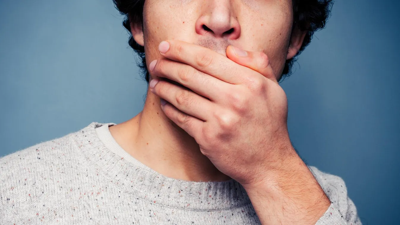 Shocked young man covering his mouth Adult Asian Ethnicity Asian and Indian Ethnicities Awe Backgrounds Bad News Behavior Casual Close-up Covering Despair Expressing Negativity Facial Expression Facial Mask Fear Human Face Human Hand Human Mouth Male Men 