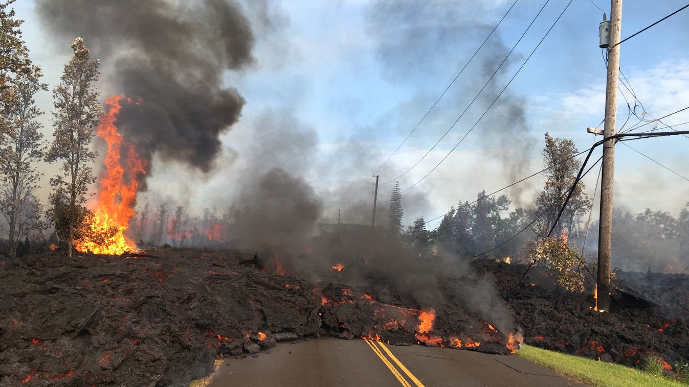 Horizontal This image released by the US Geological Survey shows  lava from a fissure slowly advancing to the northeast on Hookapu Street in Leilani Estates, Hawaii, on May 5, 2018.  
The Kilauea Volcano, the most active in Hawaii, was highly unstable on 