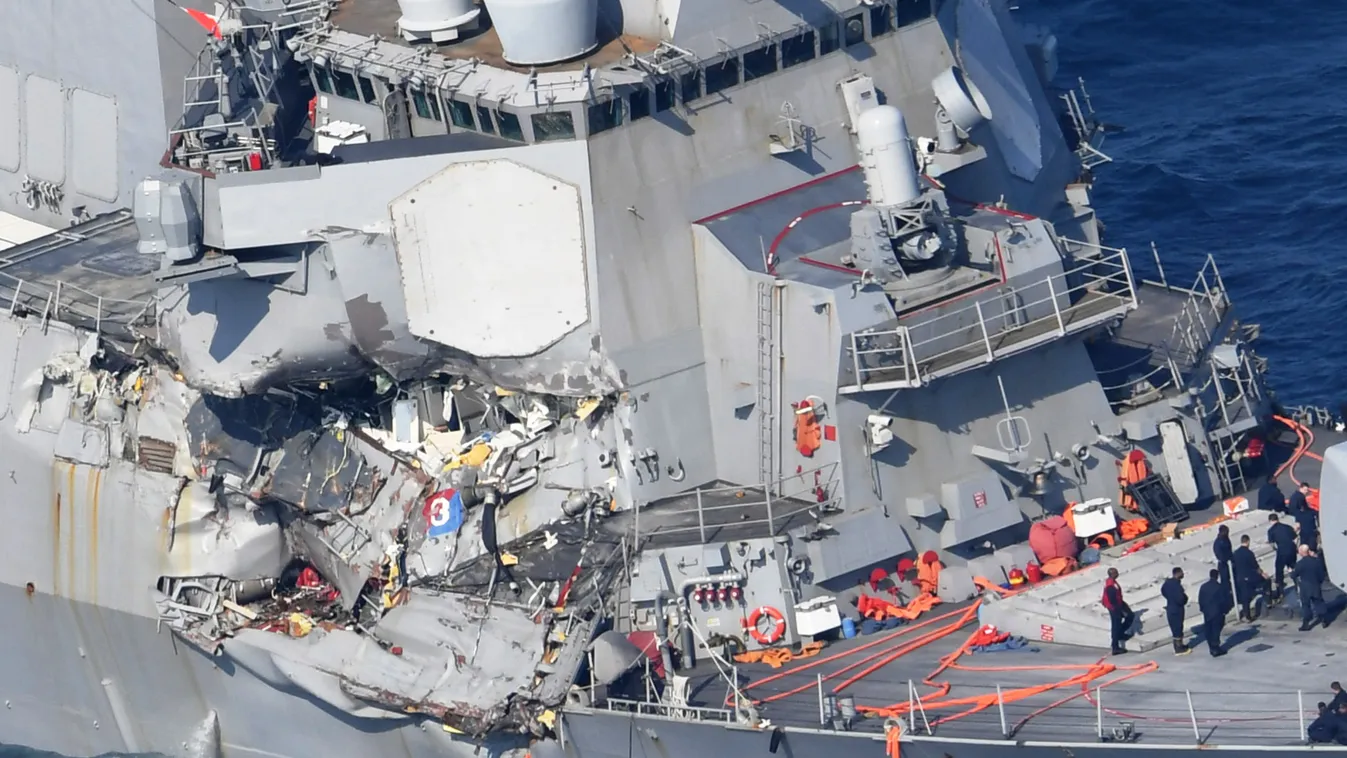 This aerial photo shows The USS Fitzgerald that is damaged by the collsion with Philippines merchant ship off the coast of Shimoda City, Shizuoka Prefecture on June 17, 2017. Japanese Coast Guard reported seven U.S. crew members were missing and one is in