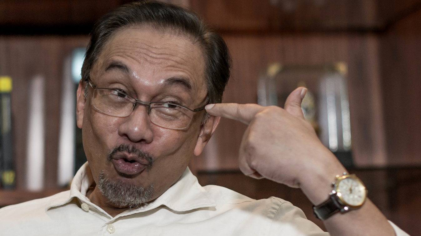 (FILES) This file photo taken on September 30, 2014 shows Malaysian opposition leader Anwar Ibrahim gesturing during an interview with Agence France-Presse at his office in Kuala Lumpur. Malaysia's highest court on February 10, 2015 upheld a sodomy convic