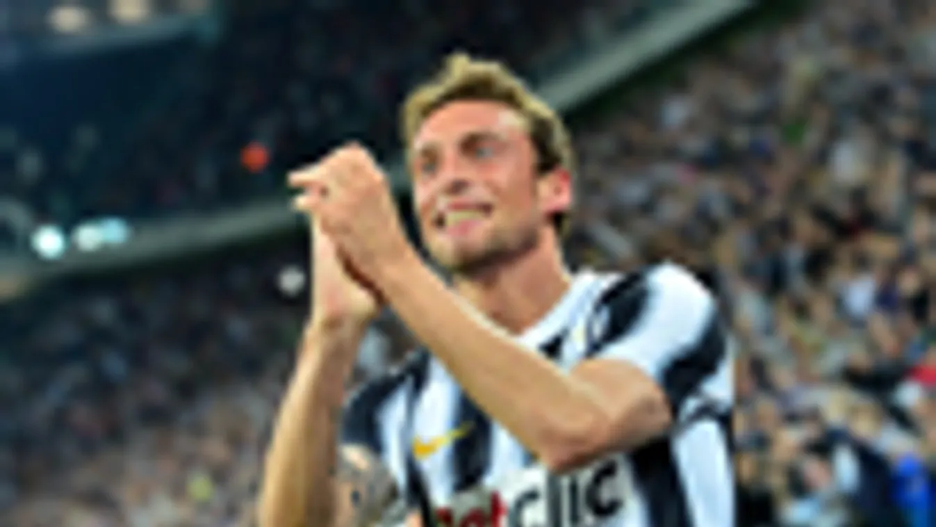Claudio Marchisio, a Juventus játékosa örül, mert csapata megnyerte az olasz bajnokságot
