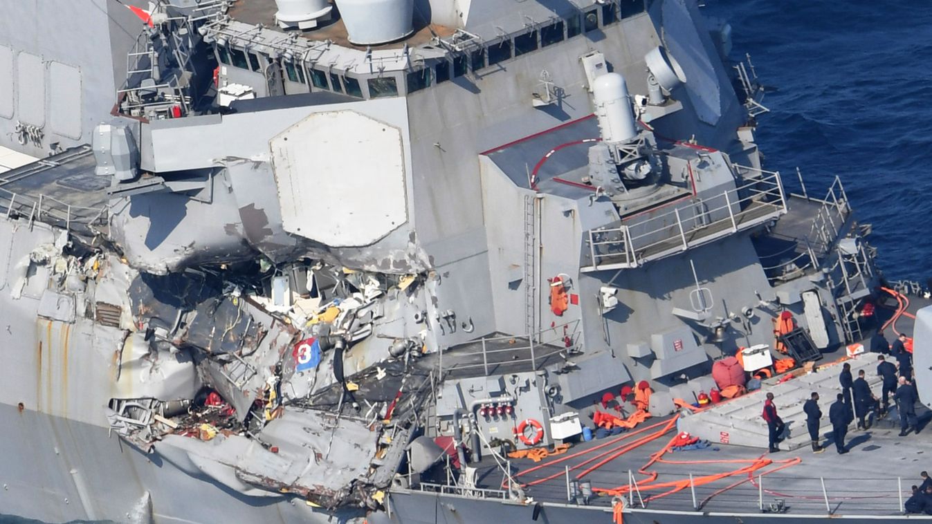 This aerial photo shows The USS Fitzgerald that is damaged by the collsion with Philippines merchant ship off the coast of Shimoda City, Shizuoka Prefecture on June 17, 2017. Japanese Coast Guard reported seven U.S. crew members were missing and one is in