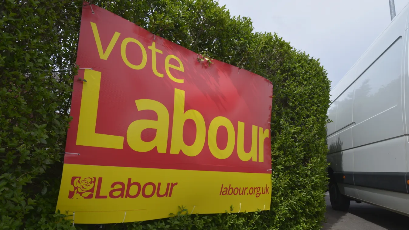 2015 UK General Election: Party Political Campaigning 2015 britain 2015 General Election Labour Liberal Democrat Placards banners signs Campaign Campaigning DEMOCRACY ELECTION General Election HOUSE OF COMMONS Lib Dems Liberal Democrats PARLIAMENT Parliam