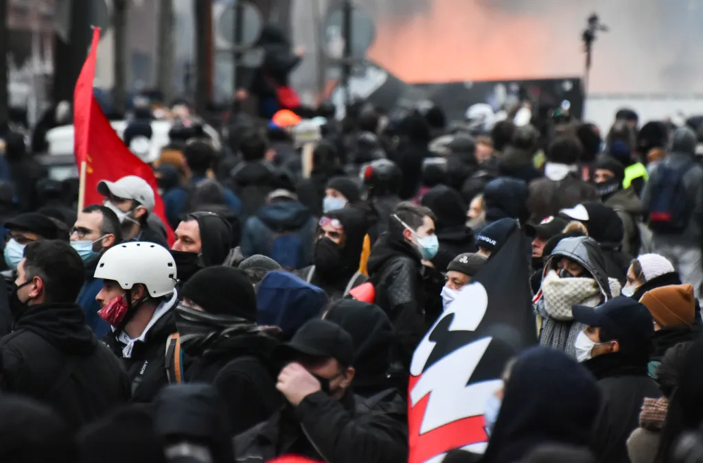 France Protests pink rally demonstrator protester protest burn fire smoke flame 