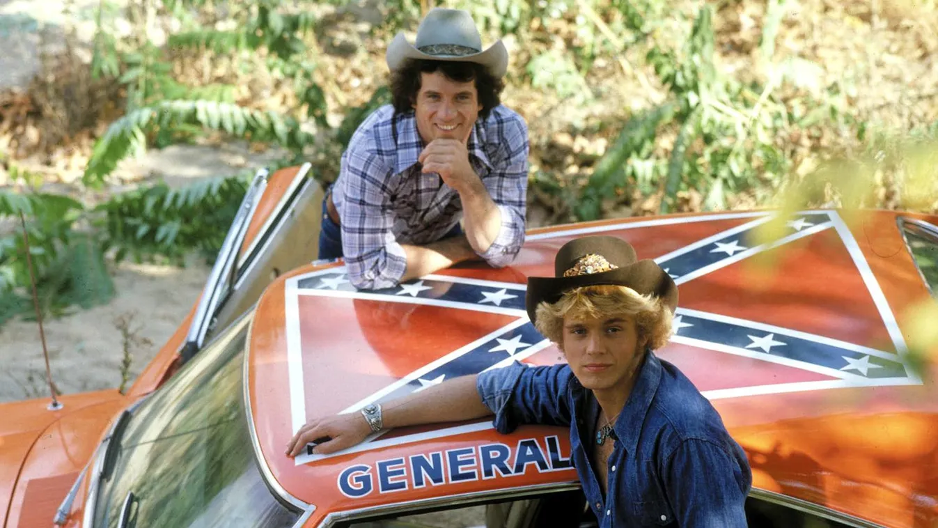 1970s tv Confederate flag Cowboy hat Drag racing General lee Schneider john Television Western clothing Wopat THE DUKES OF HAZZARD, Tom Wopat, John Schneider, 1979-1985. © CBS / Courtesy: Everett Collection 