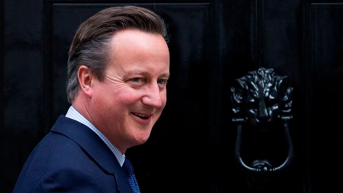 British Prime Minister David Cameron leaves 10 Downing Street to greet Luxembourg's Prime Minister Xavier Bettel for a meeting in London on October 27, 2015. The British House of Lords voted twice against government measures to cut tax credits on October 