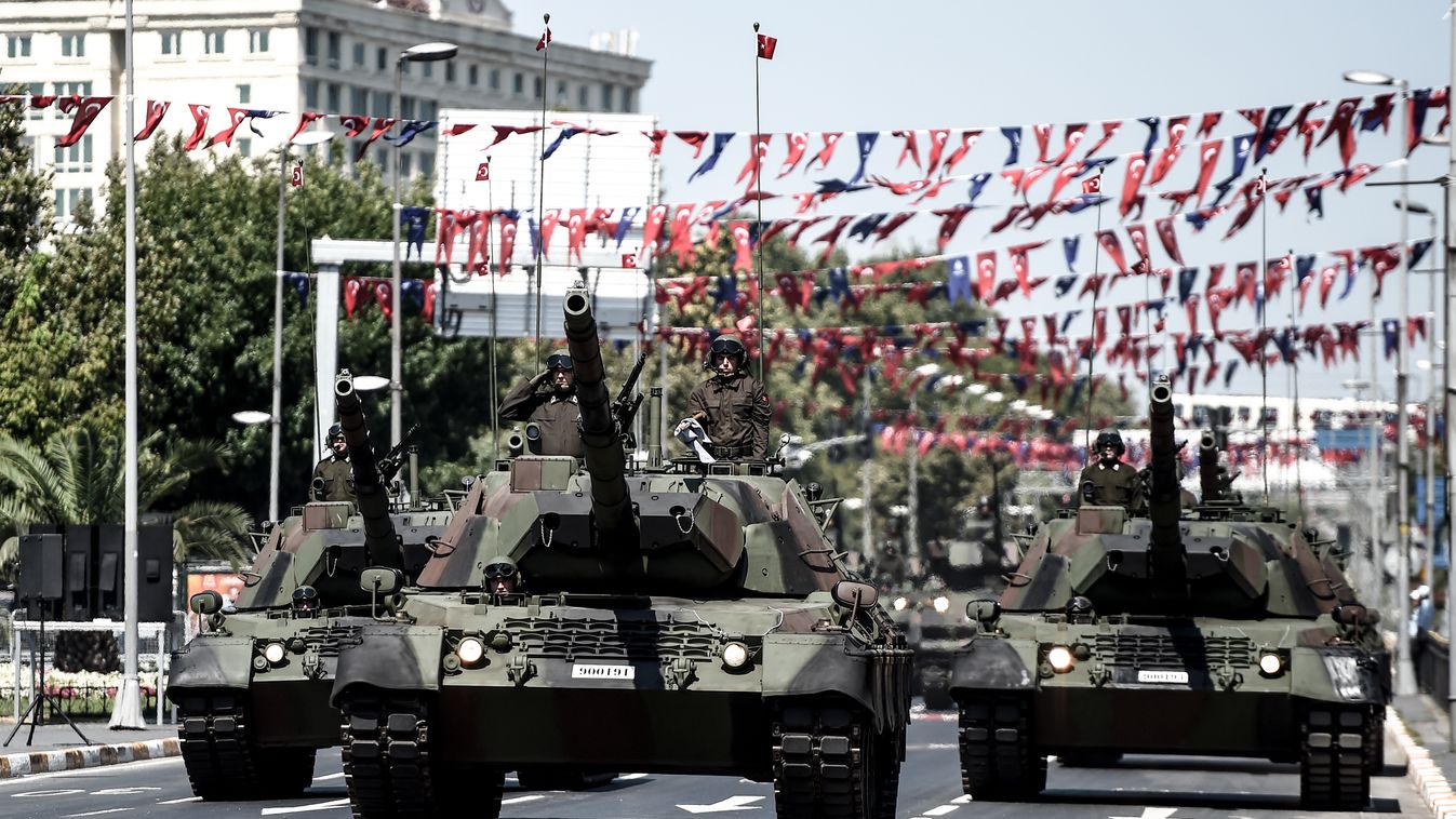 Turkish army tanks take part in a military parade marking the 93rd anniversary of Victory Day in Istanbul on August 30, 2015. Turkey commemorates the anniversary of the day in 1922 that marked the end of Turkey's independence war with a victory over Greek