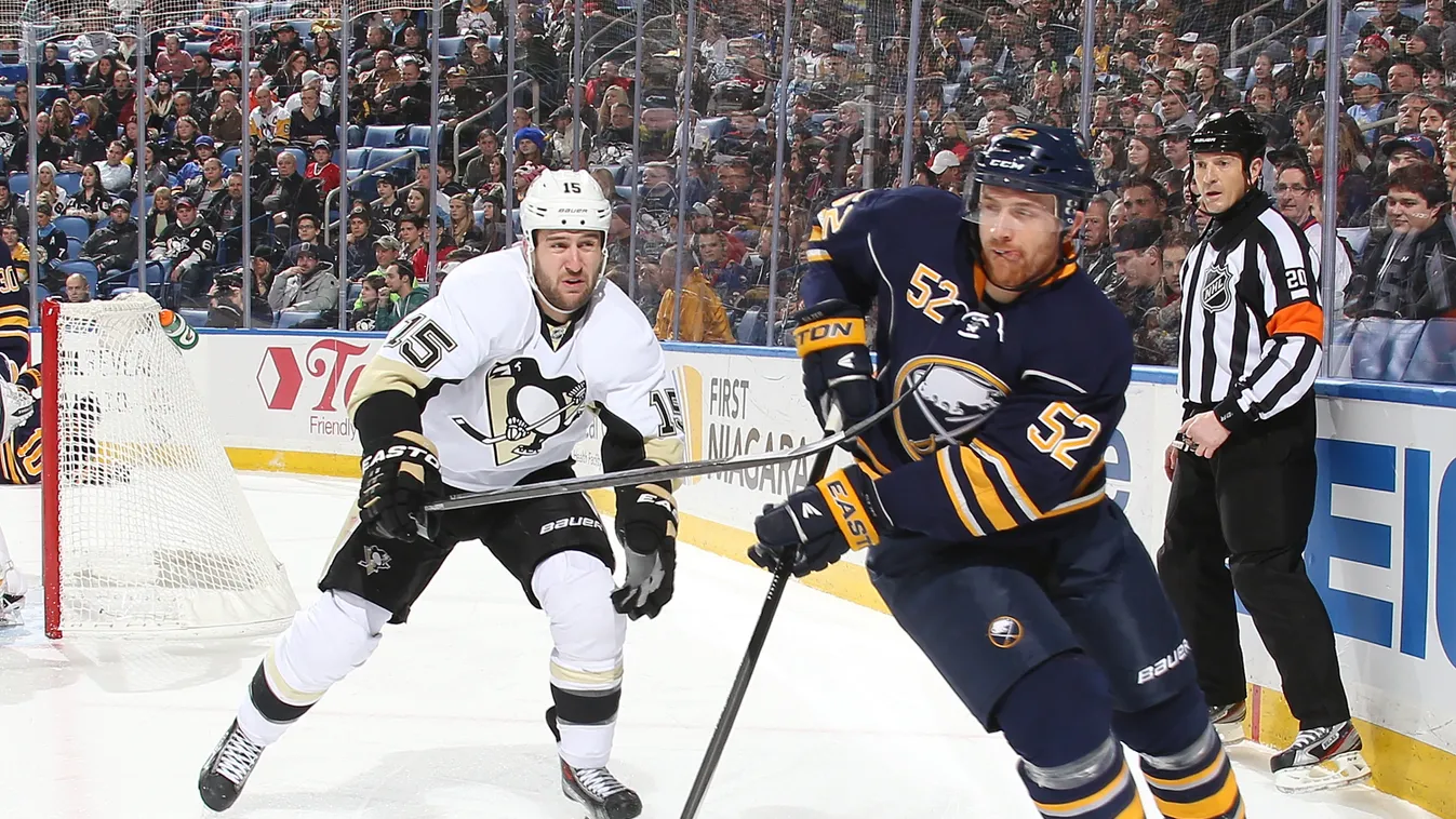 Pittsburgh Penguins v Buffalo Sabres GettyImageRank2 SPORT HORIZONTAL ICE HOCKEY Reaching USA New York State Passing Hockey Puck Buffalo - New York State Pittsburgh Penguins National Hockey League Buffalo Sabres Alexander Sulzer Hockey Tanner Glass First 