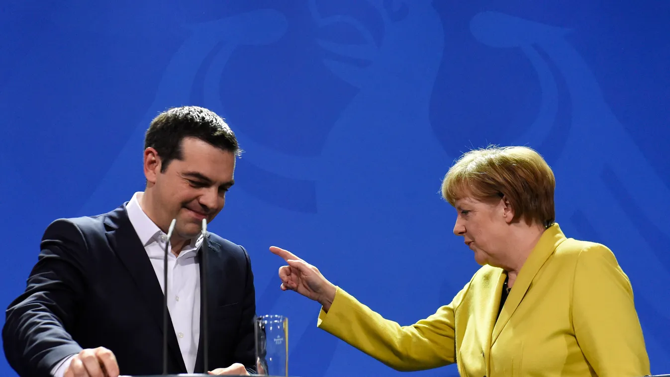 HORIZONTAL PRIME MINISTER PRESS CONFERENCE EUROPEAN UNION DIPLOMACY CHANCELOR WOMAN GESTURE German Chancellor Angela Merkel (R) points the way to Greek Prime Minister Alexis Tsipras after a press conference following talks at the chancellery in Berlin, on