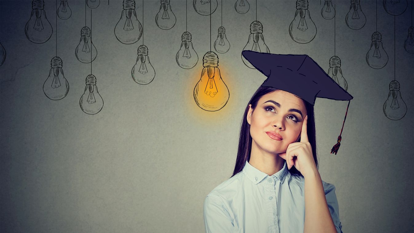 Graduate student young woman in cap gown looking up at bright light bulb woman girl think idea smart increase mind college school career clever learn lightbulb lamp rational rethink conclusion overhead study rationalization positive grad degree pondering 