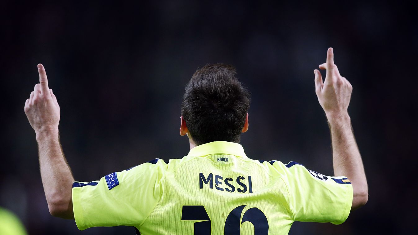 511785539 vs Barcelona's Argentinian forward Lionel Messi celebrates after scoring his second goal during the UEFA Champions League football match between Ajax Amsterdam and FC Barcelona in Amsterdam, on November 5, 2014. AFP PHOTO/ANP / OLAF KRAAK   ==NE