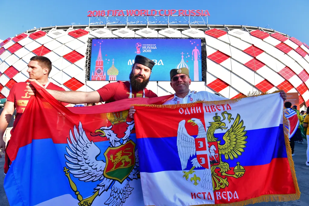 Serbia's fans pose outside the stadium before the Russia 2018 World Cup Group E football match between Serbia and Brazil at the Spartak Stadium in Moscow on June 27, 2018. / AFP PHOTO / Mladen ANTONOV 