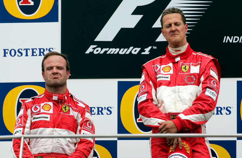 Formula One in Indianapolis - Schumacher and Barrichello Motor_Racing SPO Sports UNITED_STATES:USA F1 facial_expression formula_1 formula_one GESTURE group male HORIZONTAL 
