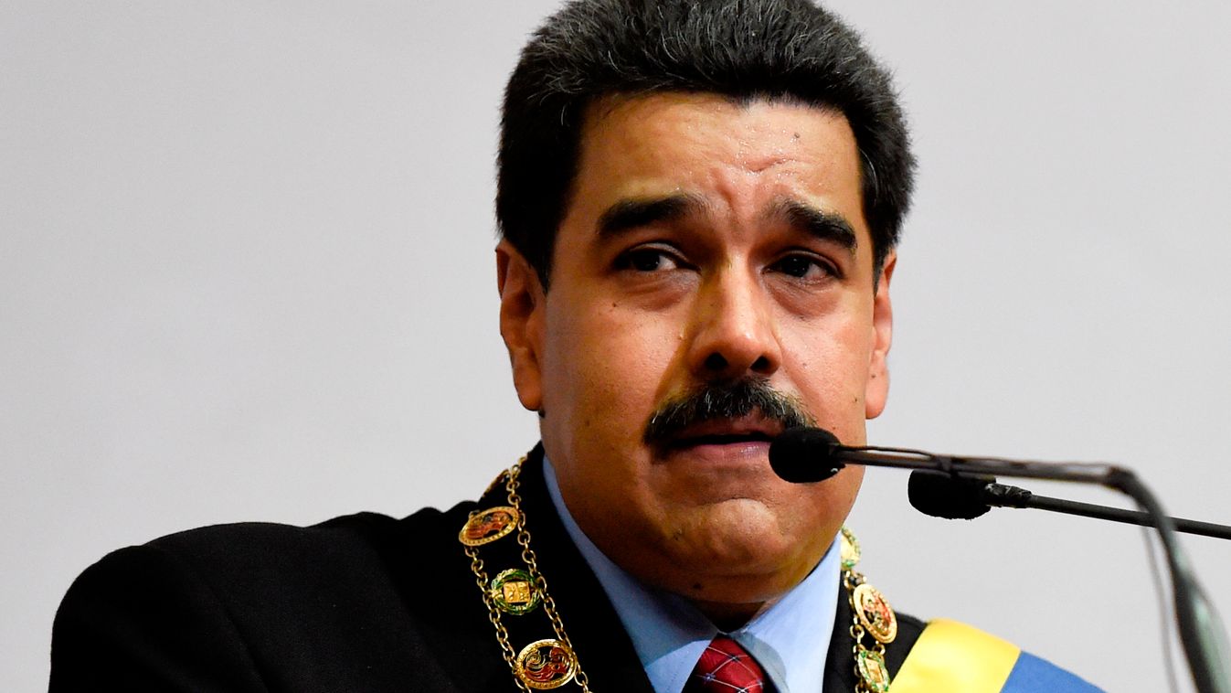 Vertical Venezuelan President Nicolas Maduro presents the annual report before the opposition controlled National Assembly  in Caracas on January 15, 2016. Venezuela's President Nicolas Maduro decreed a two-month state of "economic emergency" Friday, seiz
