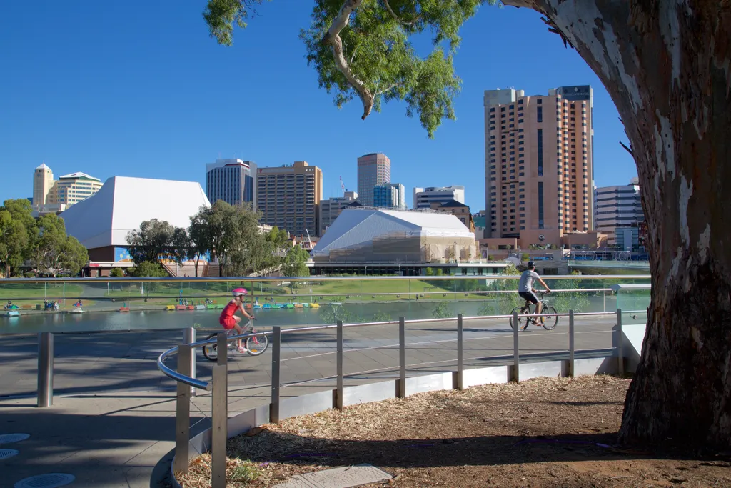 Australia, South Australia, Adelaide, View of City from Adelaide Oval travel destination photography HORIZONTAL colour image CITY adelaide oval adelaide south australia OCEANIA day outdoors building exterior ARCHITECTURE SKYSCRAPER modern two people men g