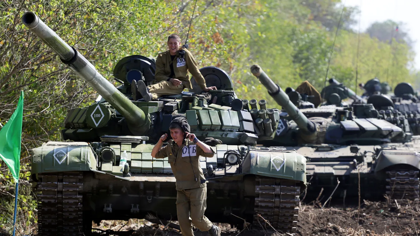 Pro-Russian separatists take part in a military competition between tank units near the town of Torez, in the Donetsk region, on September 24, 2015. Ukraine's pro-Moscow insurgents showed off their military prowess on Thursday by launching exercises invol