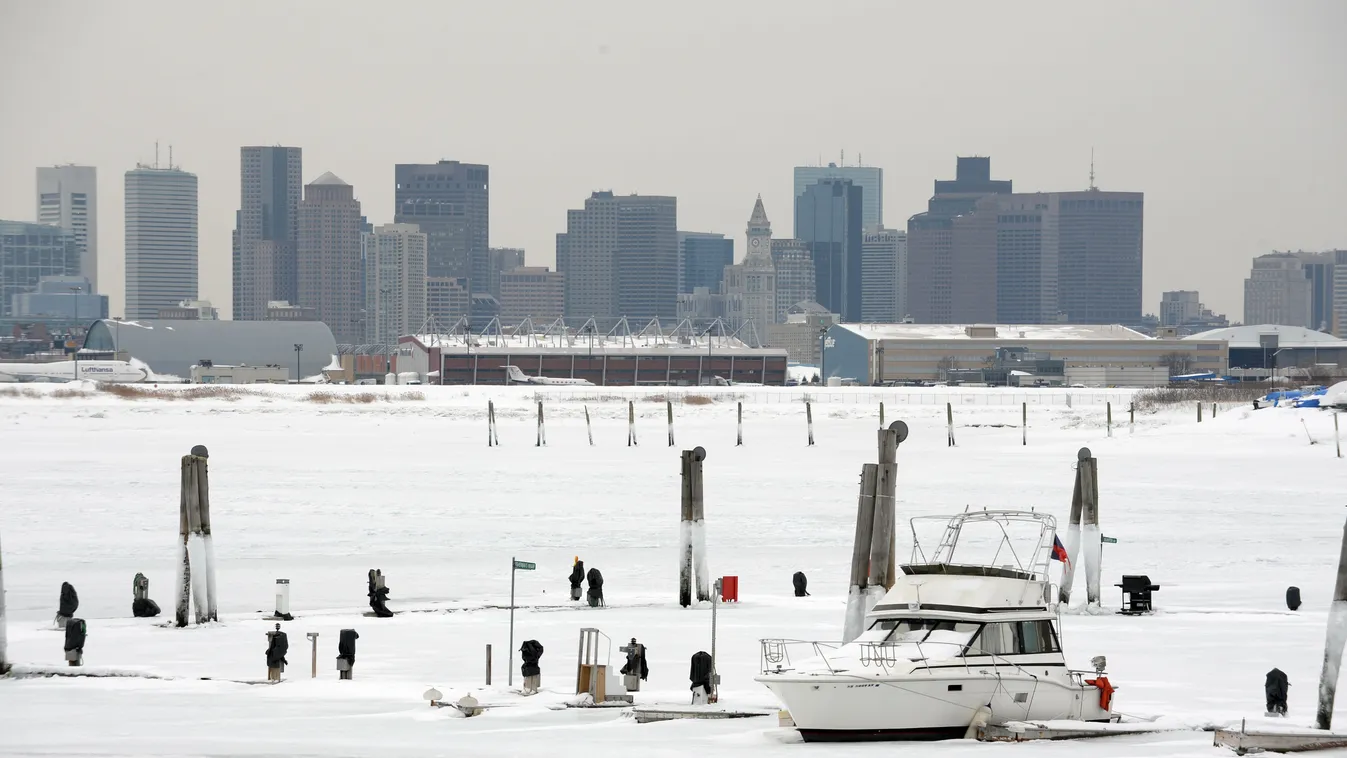 GettyImageRank2 Dock MA Nautical Vessel HORIZONTAL Sitting USA ICE Weather East Boston 2015 East Boston, Massachusetts Orient Heights Yacht Club EAST BOSTON, MA - FEBRUARY 14: A boat sits in an iced up dock at the Orient Heights Yacht Club February 14, 20