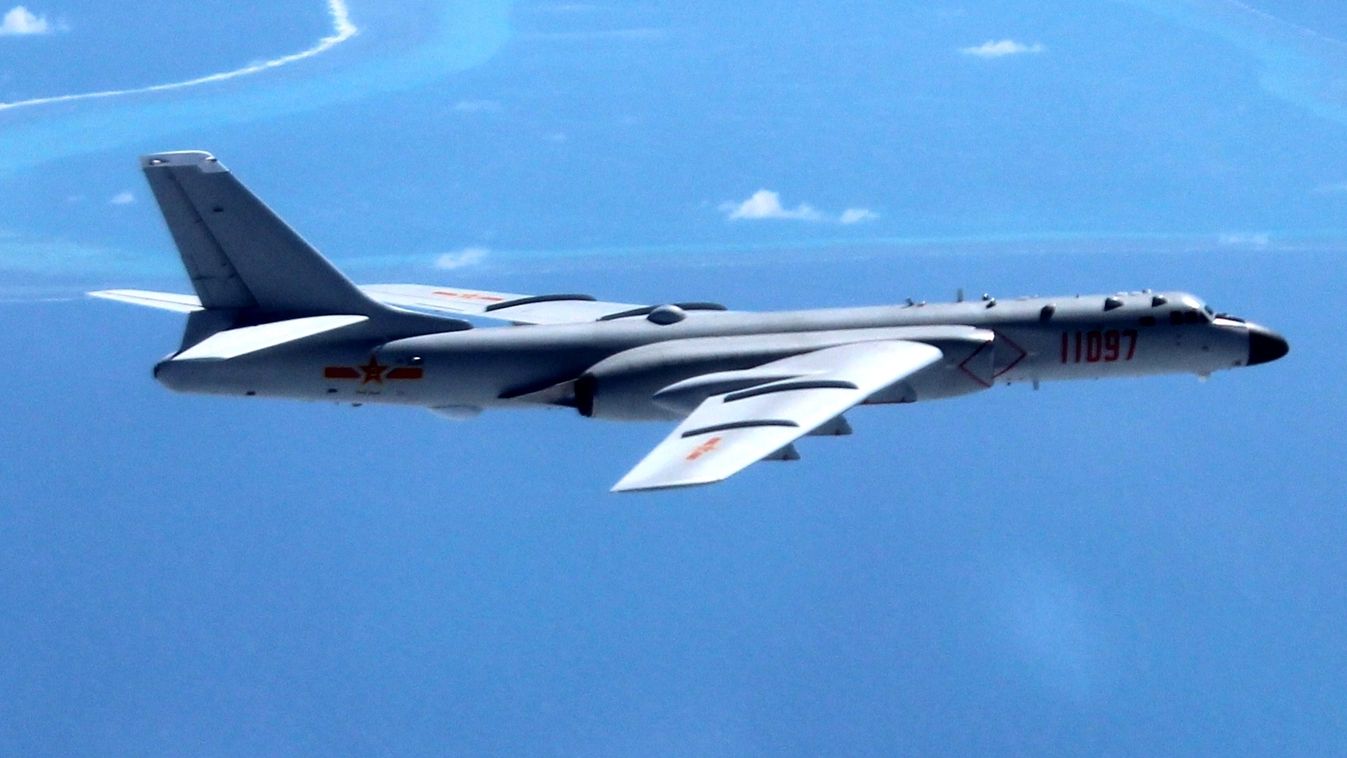 SQUARE FORMAT (160718) -- BEIJING, July 18, 2016 (Xinhua) -- Undated photo shows a Chinese H-6K bomber patrolling islands and reefs including Huangyan Dao in the South China Sea. The People's Liberation Army (PLA) Air Force conducted a combat air patrol i