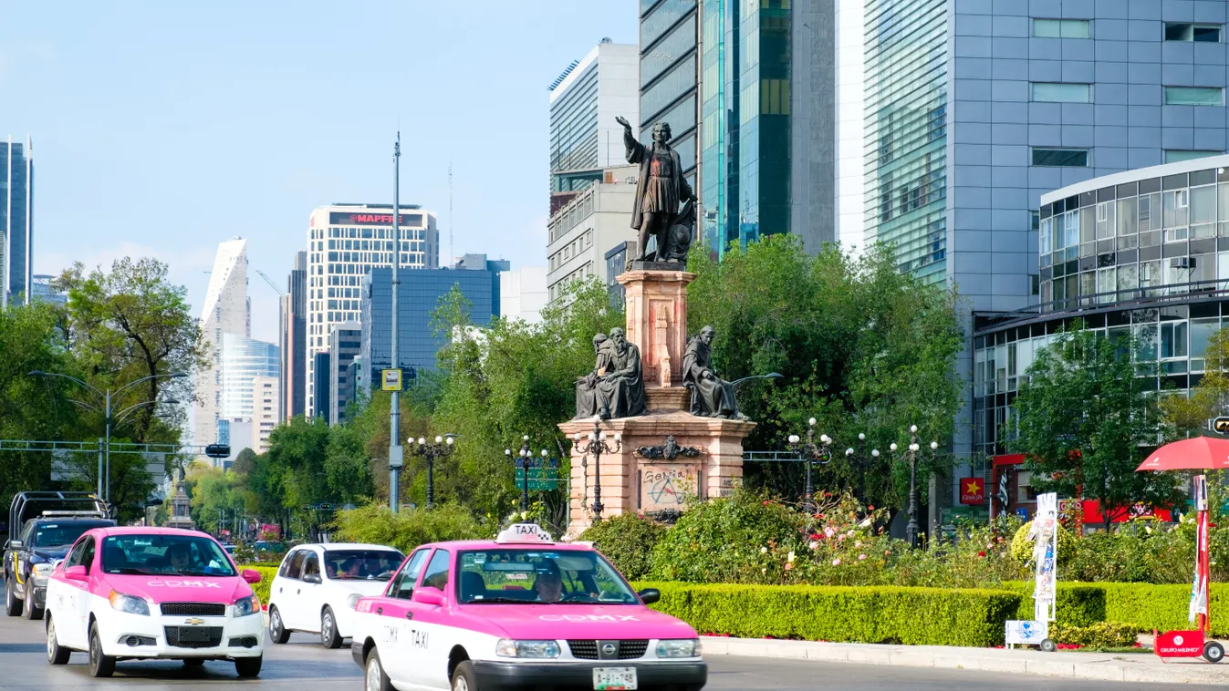 MEXICO CITY,MEXICO - DECEMBER 28,2016 : Street scene next to the Columbus Monument at Paseo de la Reforma in Mexico City 
