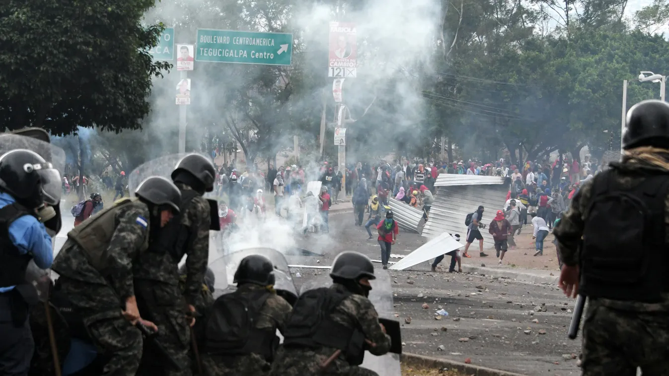 vote Horizontal Supporters of Honduran presidential candidate for the Opposition Alliance against the Dictatorship coalition, Salvador Nasralla, clash with soldiers and riot police near the Electoral Supreme Court (TSE), as the country waits for the final