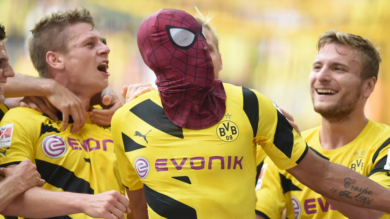 - Dortmund's Italian striker Circo Immobile (R), Dortmund's Polish defender Lukasz Piszczek (L) celebrate after Dortmund's Gabonese striker Pierre-Emerick Aubameyang, who put on a Spiderman mark, scored the 2-0 goal during the German Supercup football mat