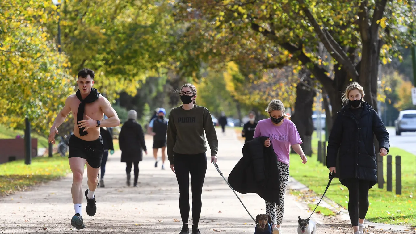 health virus pandemic Horizontal People exercise in Melbourne on June 1, 2021 on the fifth day of a seven-day lockdown as Melbournians prepare for an extension to the lockdown as the city battles with an outbreak of the Indian variant of Covid-19. (Photo 
