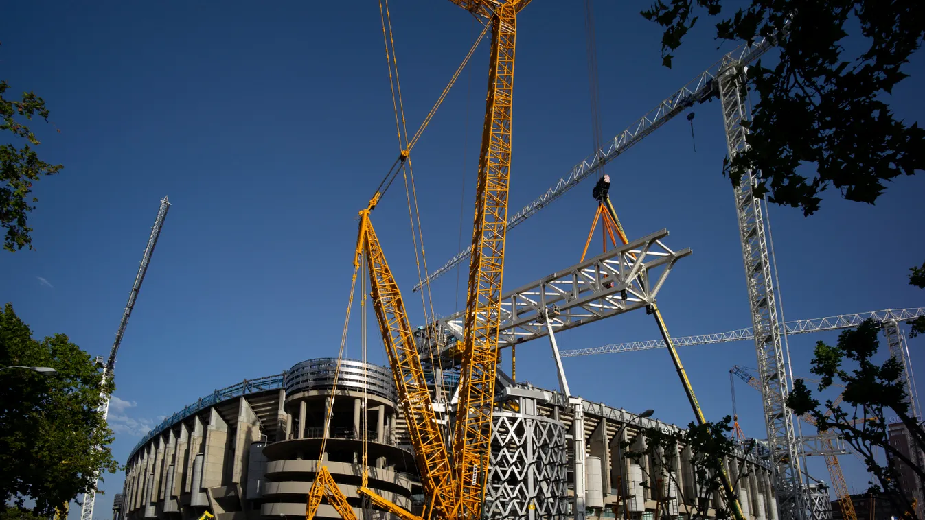 Renovation At The Stadium Santiago Bernabeu In Madrid modern stadium Renovation new stadium Santiago Bernabeu new leisure spaces degree scoreboard retractable roof Oscar Gonzalez NurPhoto Madrid world Spain SUMMER CONSTRUCTION CRANE outdoor SKY tree No Pe