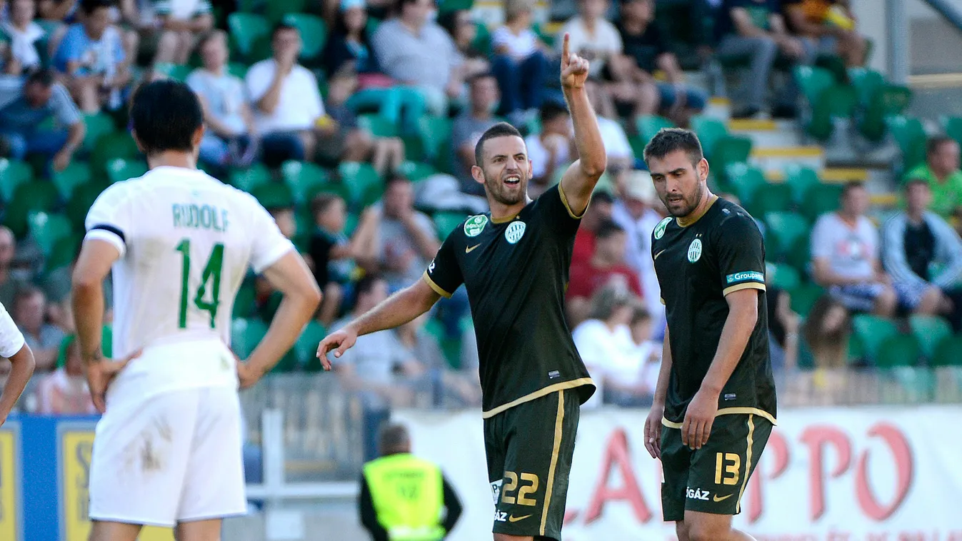 Győr, 2014. augusztus 17.
Busai Attila, a Ferencváros játékosa (k) örül a góljának az OTP Bank Liga 4. fordulójában játszott Győri ETO FC - Ferencváros mérkőzésen Győrben 2014. augusztus 17-én.
MTI Fotó: Kovács Tamás 