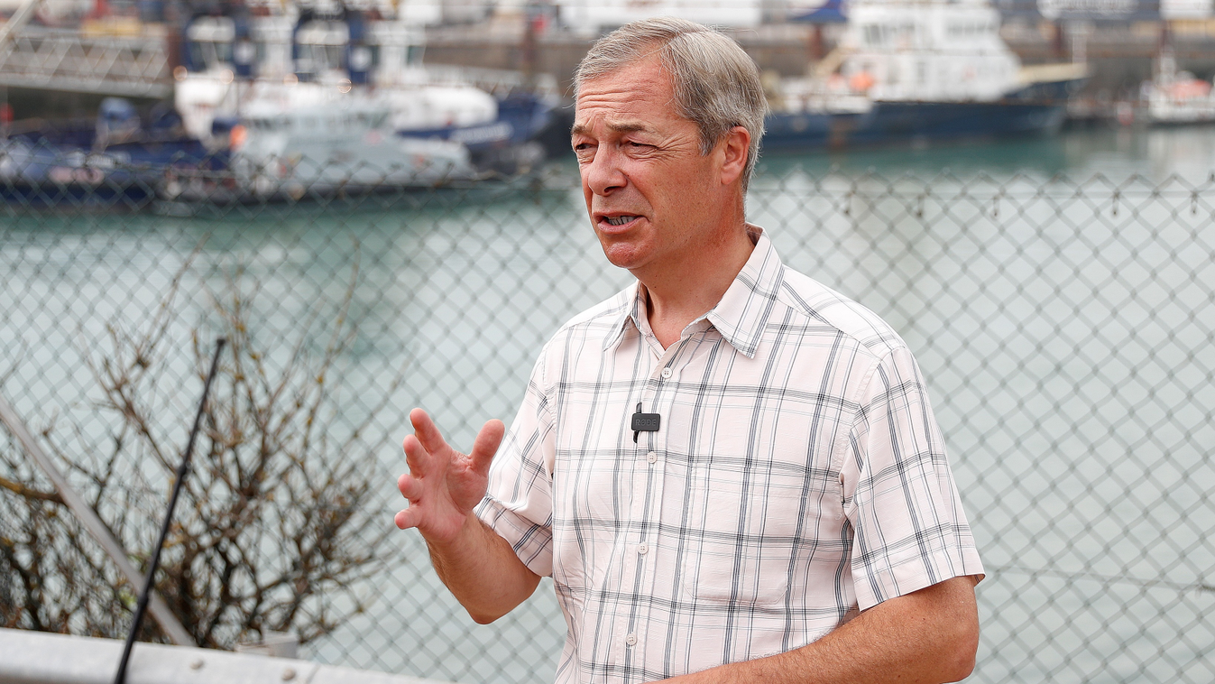 migration illegal-immigrants Horizontal Brexit Party leader Nigel Farage addresses members of the media near Dover Port in Dover, southeast England on August 12, 2020. - British Prime Minister Boris Johnson on Monday said illegal migrant crossings of the 