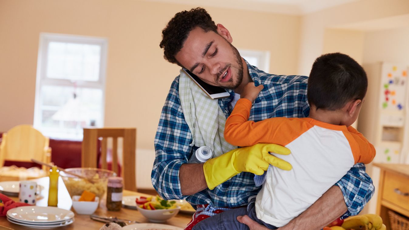 Busy Father Looking After Son Whilst Doing Household Chores Using Phone Chores Men Two People Meal Multi-Tasking Preschool Building Housework Holding Cooking Cleaning African Ethnicity Southeast Asian Ethnicity Caucasian Ethnicity Togetherness Indoors Hor