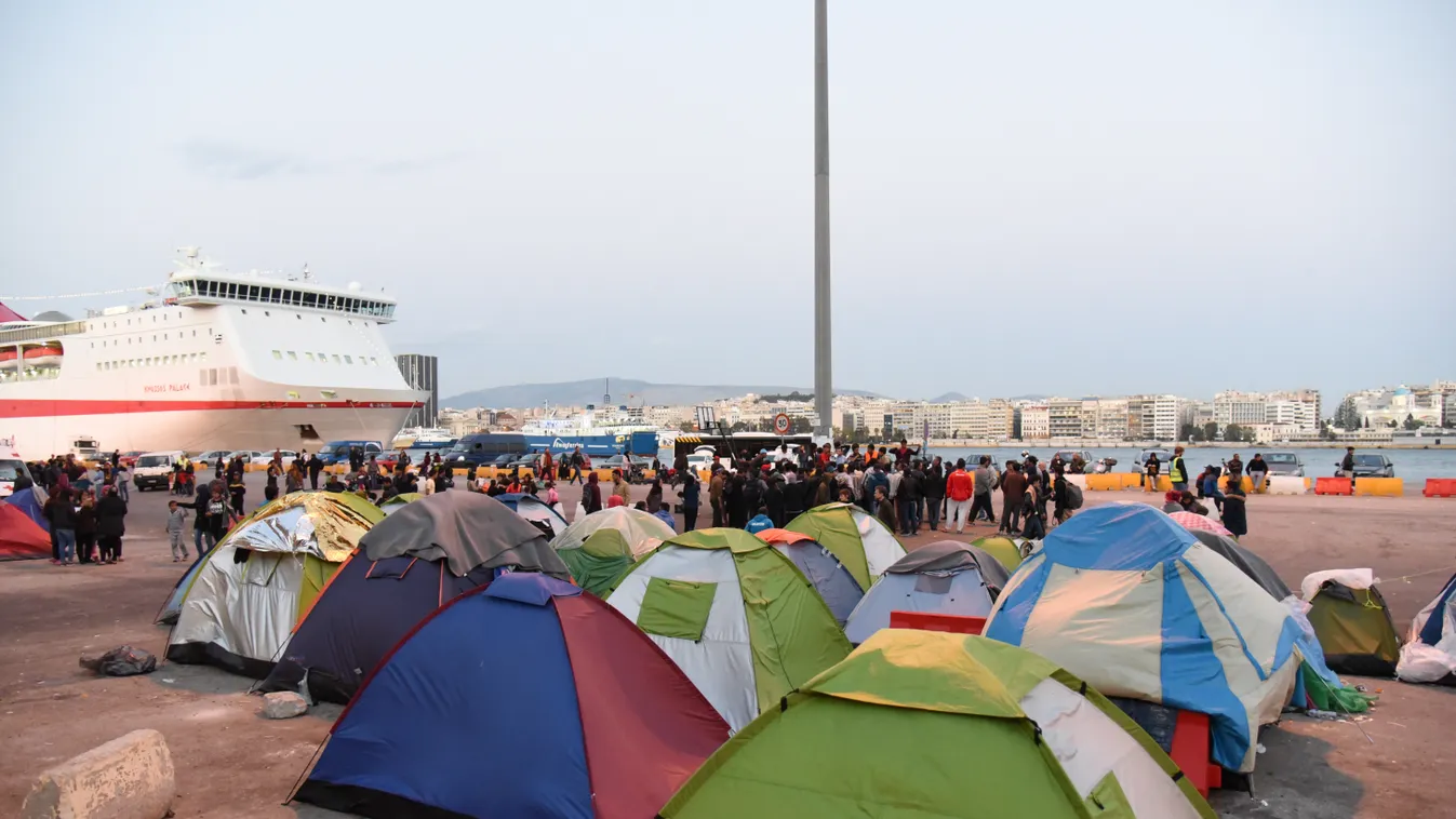Refugees and migrants leave the port of Piraeus BORDER busses closed crisis e 2 EVACUATION greece hellas IMMIGRANT immigrants passenger piraeus PORT REFUGEE refugees SQUARE FORMAT 
