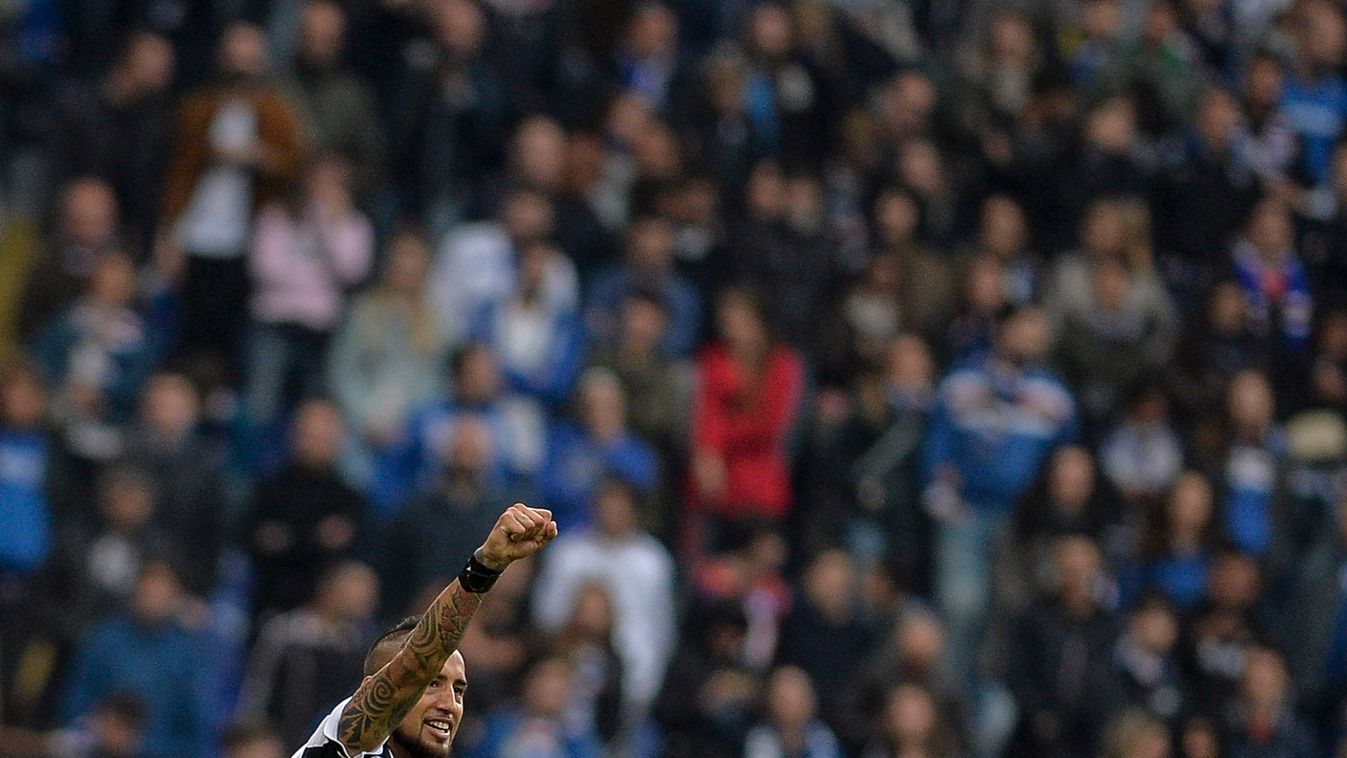 504226185 Juventus' midfielder from Chile Arturo Vidal celebrates after scoring against Sampdoria during their Italian Serie A football match on May 2, 2015 at Sampdoria's Luigi De Ferraris stadium. AFP PHOTO / ANDREAS SOLARO 