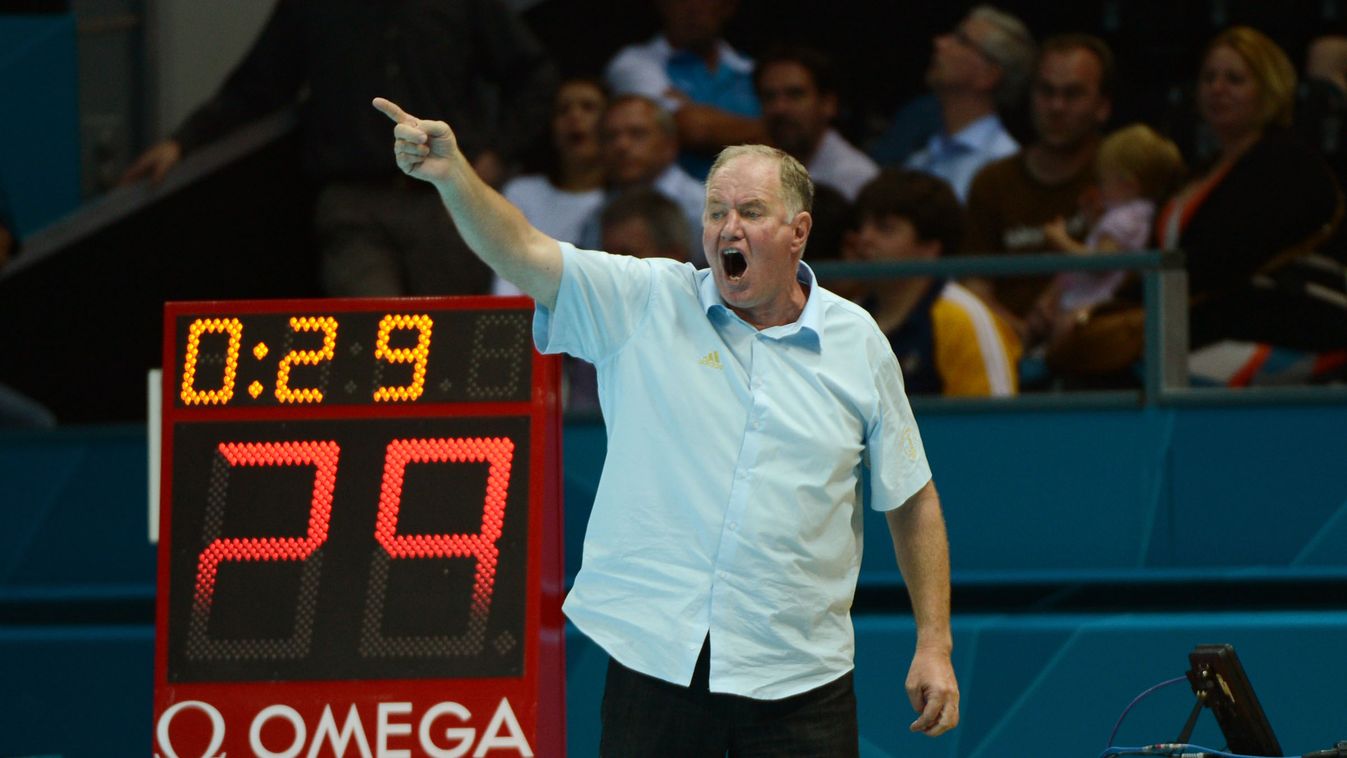 148073310 Hungary’s head coach Denes Kemeny reacts during the men’s water polo preliminary match between Romania and Hungary of the London 2012 Olympic Games on August 2, 2012 in London. AFP PHOTO / KHALED DESOUKI 