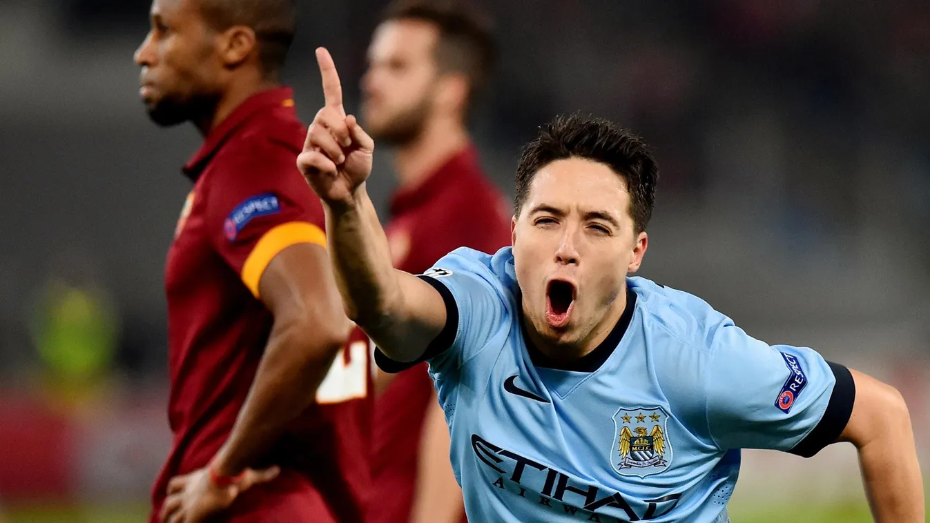 511785575 Manchester City's French midfielder Samir Nasri celebrates after scoring during the UEFA Champions League football match AS Roma vs Manchester City on December 10, 2014 at the Olympic stadium in Rome.        AFP PHOTO / GABRIEL BOUYS 