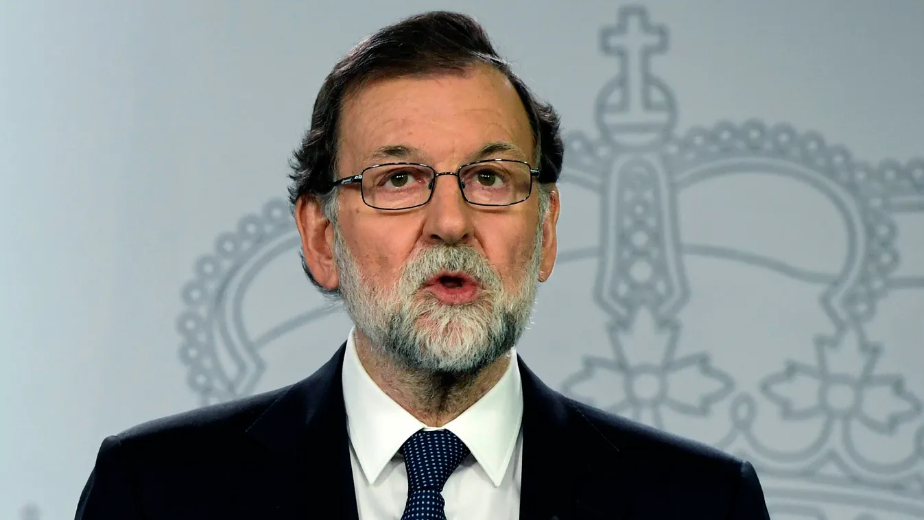 referenda Horizontal Spanish Prime Minister Mariano Rajoy speaks during a press conference at La Moncloa palace in Madrid on October 1, 2017.

Spanish riot police firing rubber bullets forced their way into activist-held polling stations in Catalonia toda