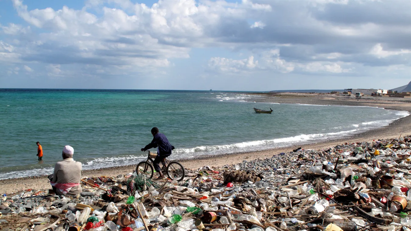 Auteur Beach Bicycle Cycling Cyclist Demotes Dirt Environment Geography Hadibo Landscape Man Middle East Outdoors People Pollution Road Transport Rubbish Sea Seaside Socotra Island Transport Water Yemen HORIZONTAL Yemen, Socotra island, Hadibo, garbage on