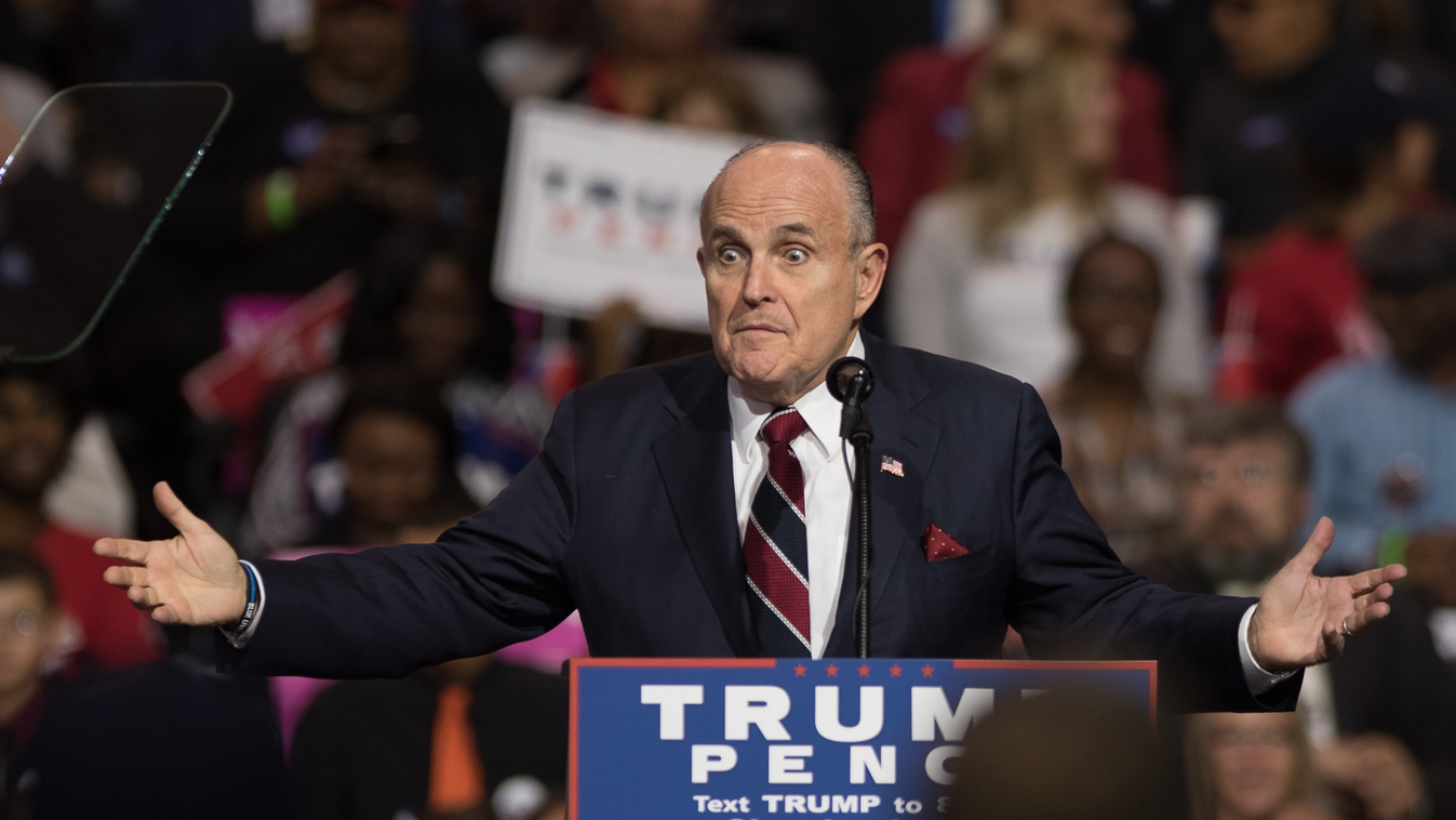 GettyImageRank2 ELECTION POLITICS CLEVELAND, OH - OCTOBER 22: Rudy Giuliani introduces Republican vice-presidential nominee Mike Pence during his campaign stop along side presidential nominee Donald Trump at the International Exposition Center on October 