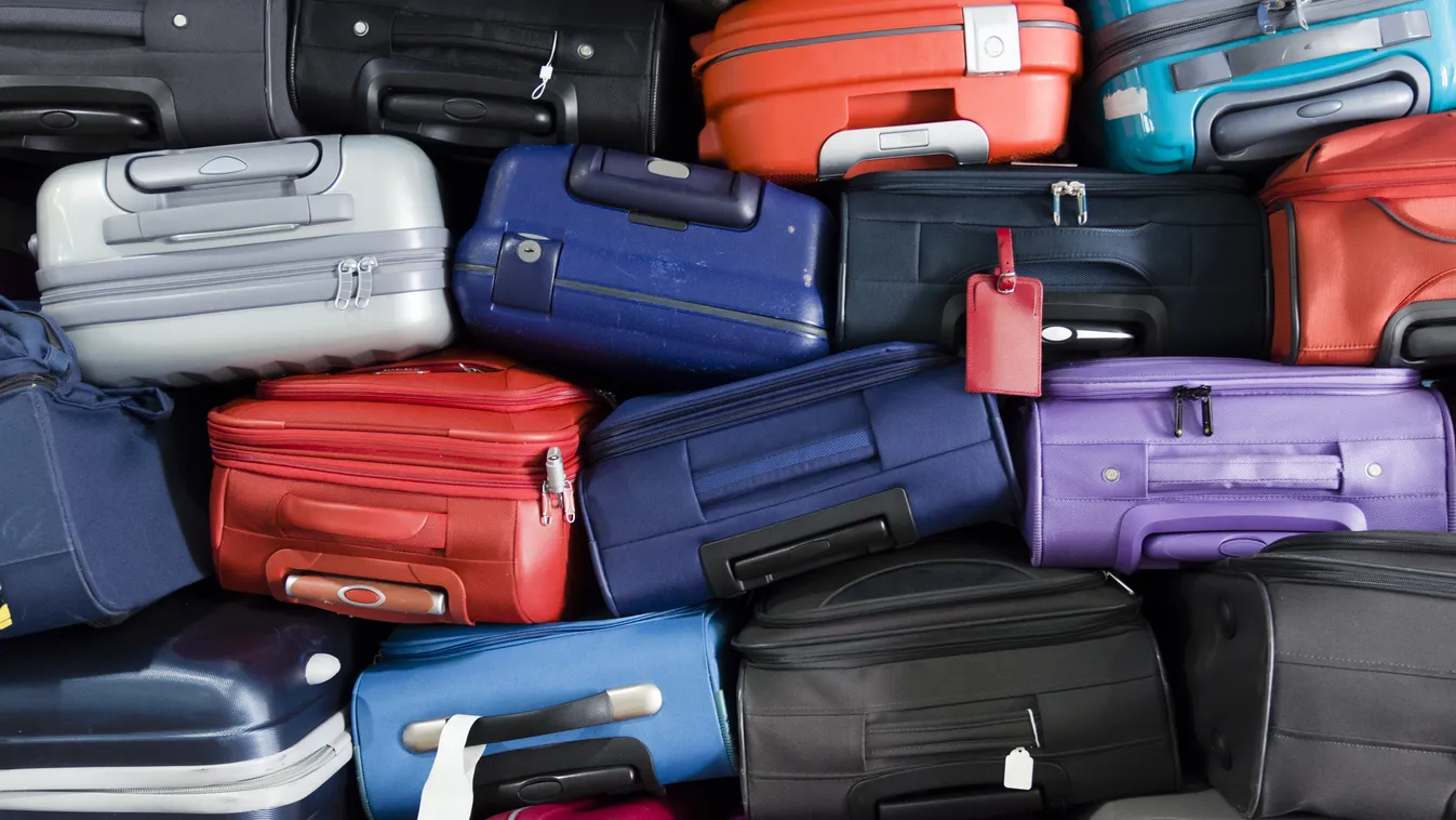 Suitcases,Multicolor,Stacked,For,Transport,One,Above,The,Other 