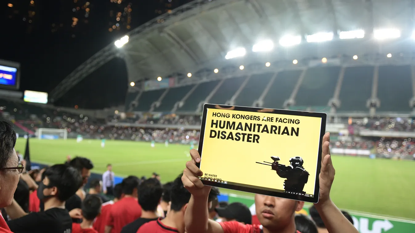 demonstration unrest TOPSHOTS Horizontal SPORTS FAN STAND FOOTBALL PLACARD SLOGAN ON THE FRINGE OF CONFLICTS 