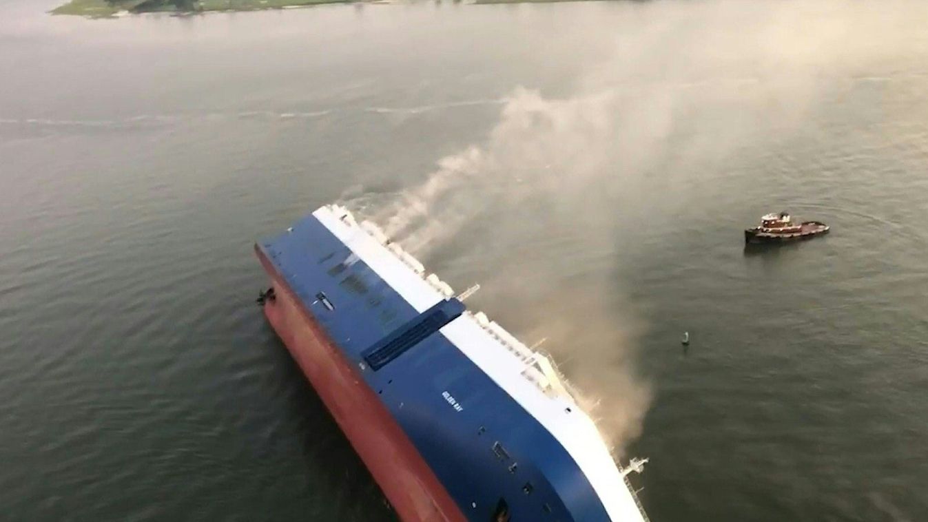 Horizontal A US Coast Guard video grab shows the Coast Guard and port partners searching for crewmembers September 8, 2019 after the 656-foot vehicle carrier "Golden Ray" overturned in the St. Simons Sound near Brunswick, Georgia. - US Coast Guard officia