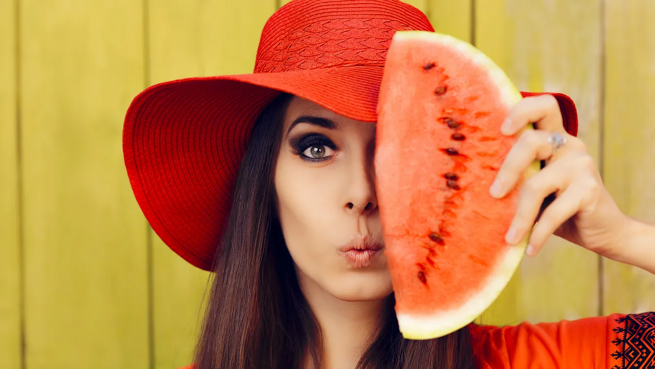 Surprised Woman in Red Hat with Watermelon Slice Beautiful Fashion Healthy Eating Portrait Girls Women Females Dieting Vegetarian Food Hungry Raw Food Sun Hat Counting Organic Cute Watermelon Mexican Culture Young Adult Asking Looking Thinking Holding Sna