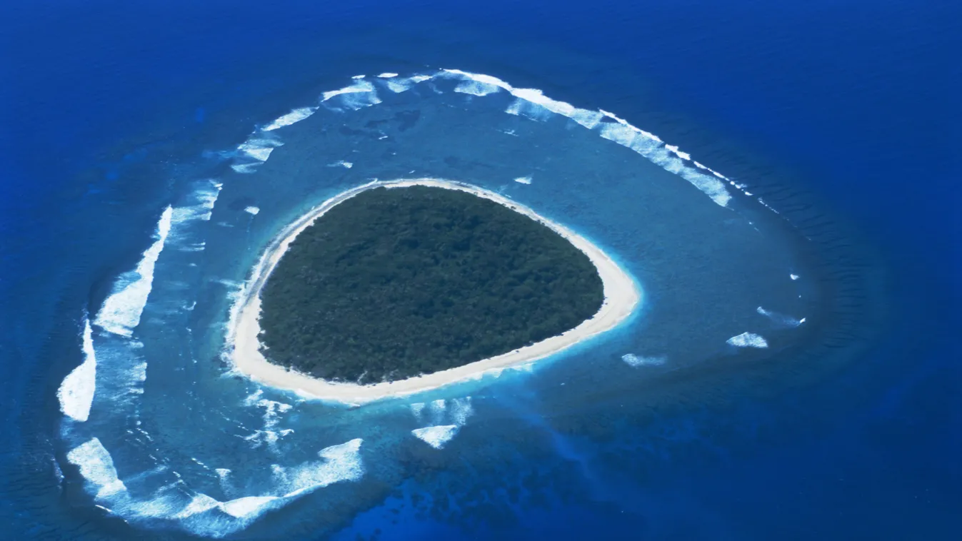 Aerial view, reef formation and island, Fiji, South Pacific islands, Pacific aerial AERIAL VIEW BEACH BLUE COLOUR CAST circle coast coastline COLOR color image colour contemporary day daytime distance distant ENVIRONMENT Fiji fijian formation holiday HORI