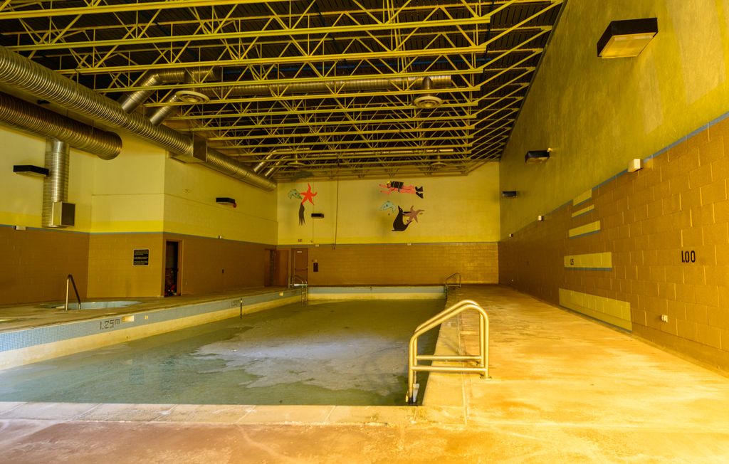 Continuing Education Day 5 Ghost Towns Tour Kitsault UNBC The pool with scum covered water. 