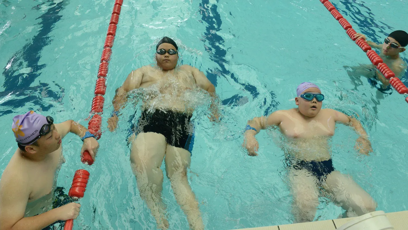 Summer camps held across China to help obese children lose weight China Chinese Henan Zhengzhou obese obesity overweight overweighted children teenager 