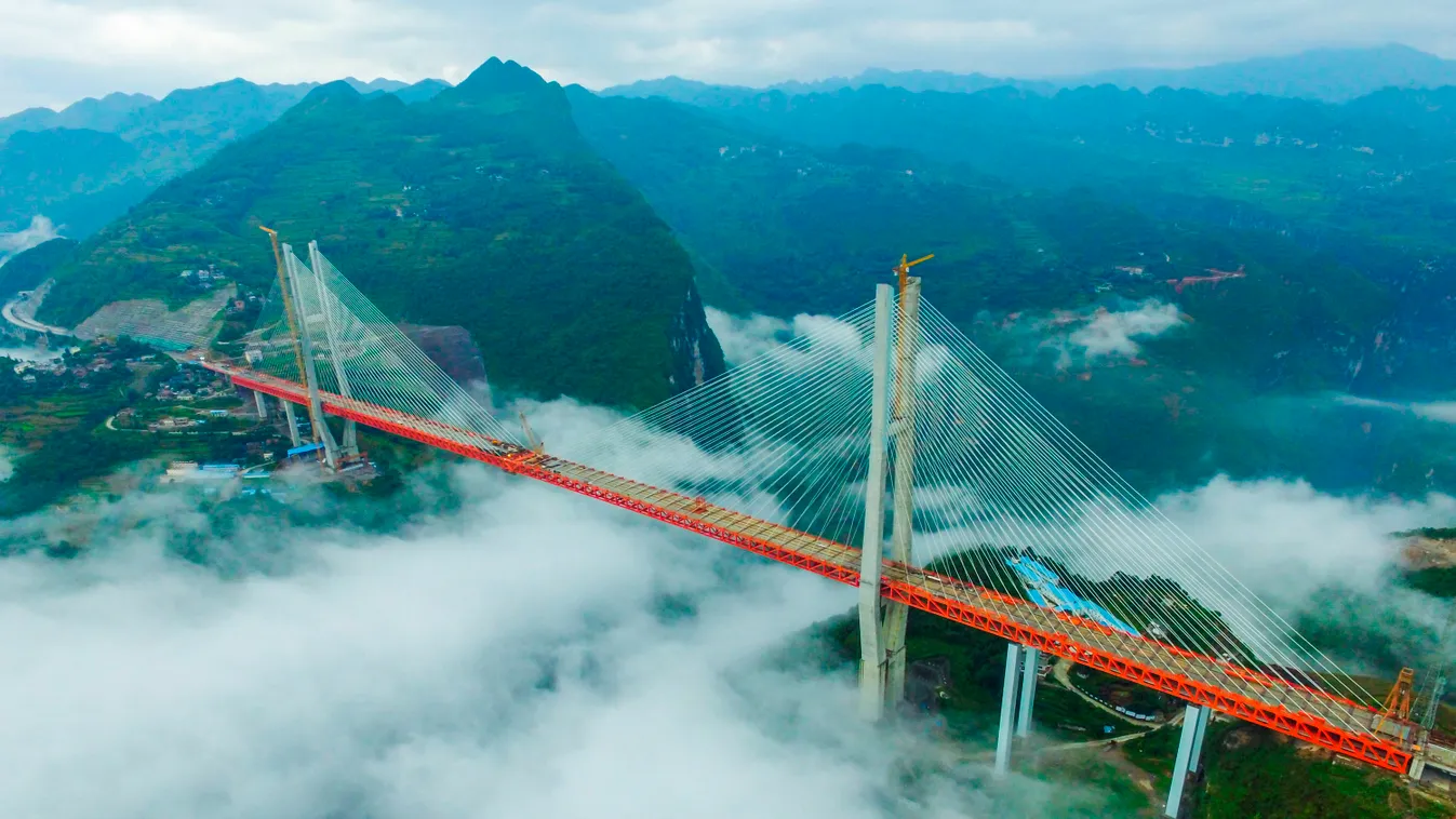 Horizontal This picture taken on September 10, 2016 shows the Beipanjiang Bridge, near Bijie in southwest China's Guizhou province.
Chinese engineers linked the two ends of the bridge on September 10, completing the structure of what is expected to become