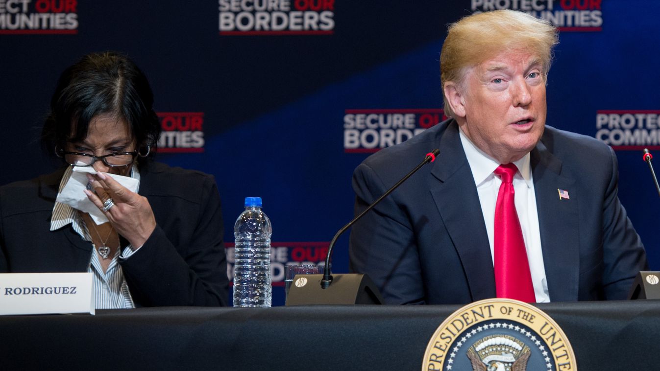 politics Horizontal US President Donald Trump speaks alongside Evelyn Rodriguez (L), whose daughter was killed by MS-13 gang members, during a roundtable discussion on immigration at Morrelly Homeland Security Center in Bethpage, New York, May 23, 2018. /